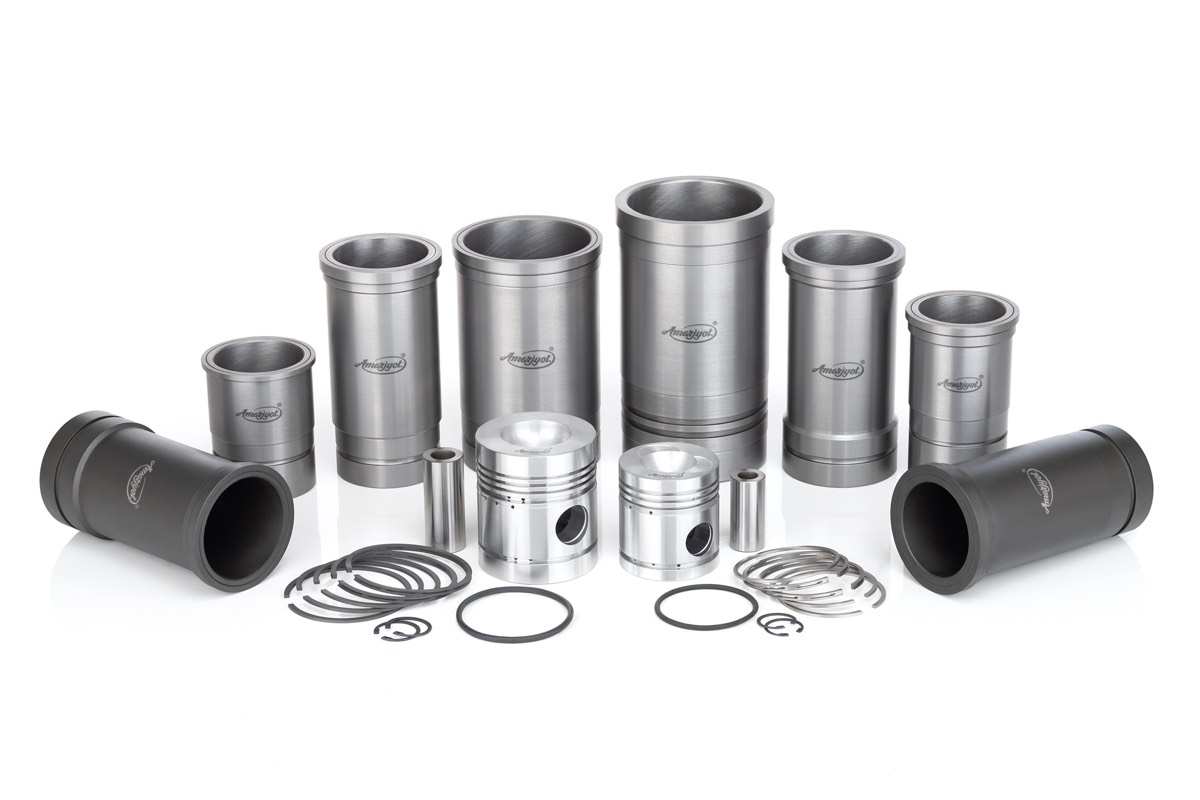 A family of Amarjyot cylinder liners in several heights and finishes, with pistons and rings